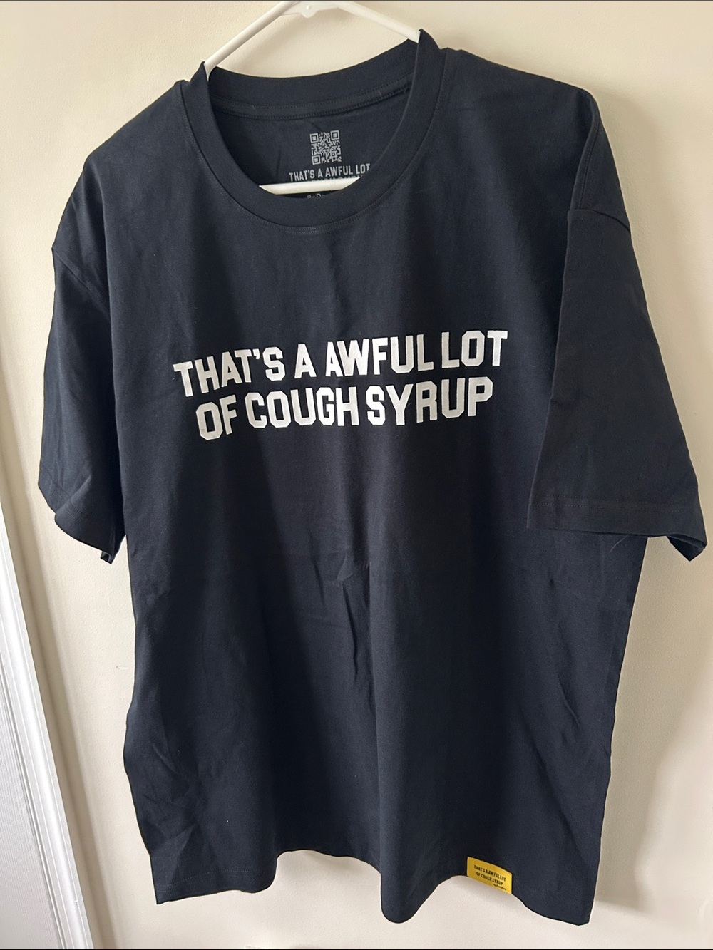 Black Graphic Tee with White Text - "That's A Awful Lot of Cough Syrup"